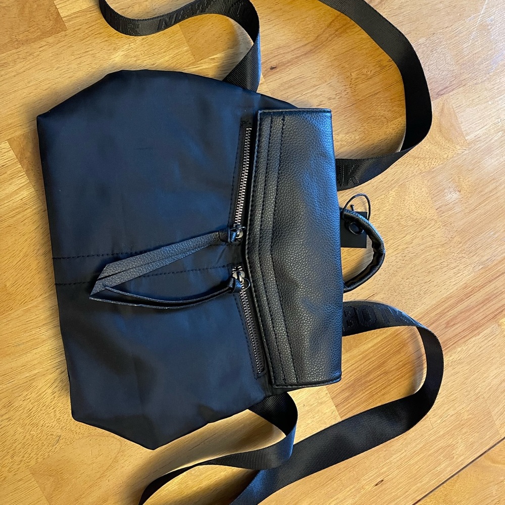 Botkier New York mini black backpack.